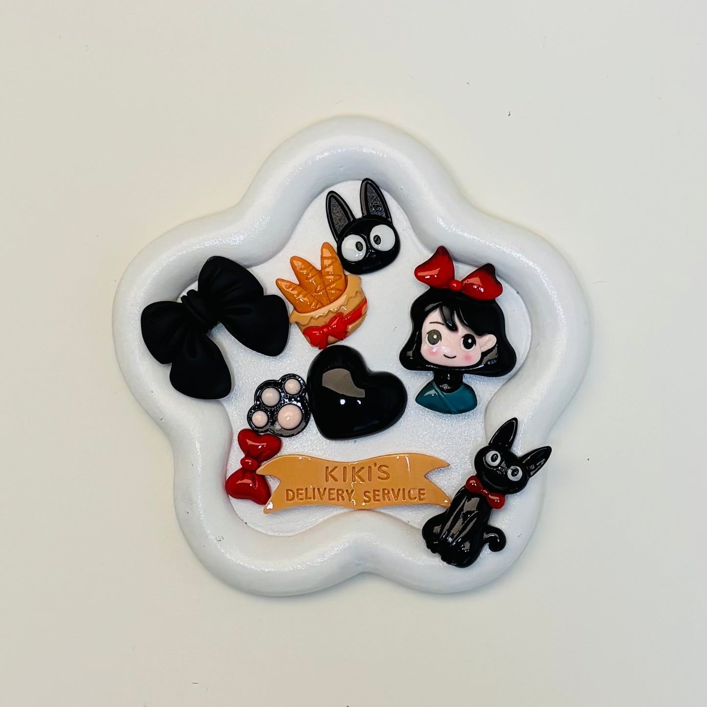 Kiki charms